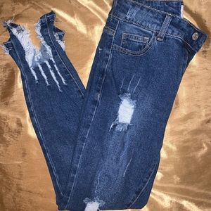 Dark denim distressed jeans